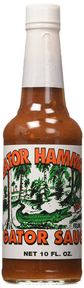 Gator Hammock Gator Sauce 10oz bottle pour for wings and tacos with bold cayenne flavor.