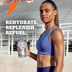 Gatorade Thirst Quencher 20oz bottle on gym shelf for quick refreshment