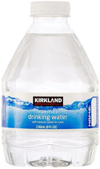 Generic purified water 8 oz bottle close-up for travel and gym.