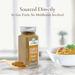 Geo-Fresh Organic Curry Powder kitchen-scene, glass jar and fresh packaging shown.