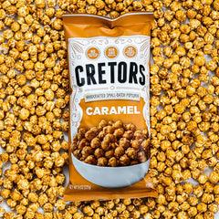 Six-pack box of G.H. Cretors caramel corn, great for gatherings
