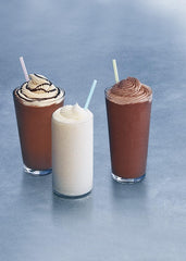 ghirardelli frappe cup with straw ready to drink indulgence for chocolate cravings.