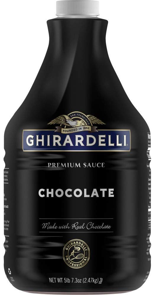 Ghirardelli premium chocolate sauce bottle pouring over coffee for a mocha topping