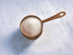 Ghirardelli white chocolate drink prepared in a hot mug with the powder