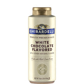 Ghirardelli white chocolate sauce bottle front view for rich coffee enhancements.