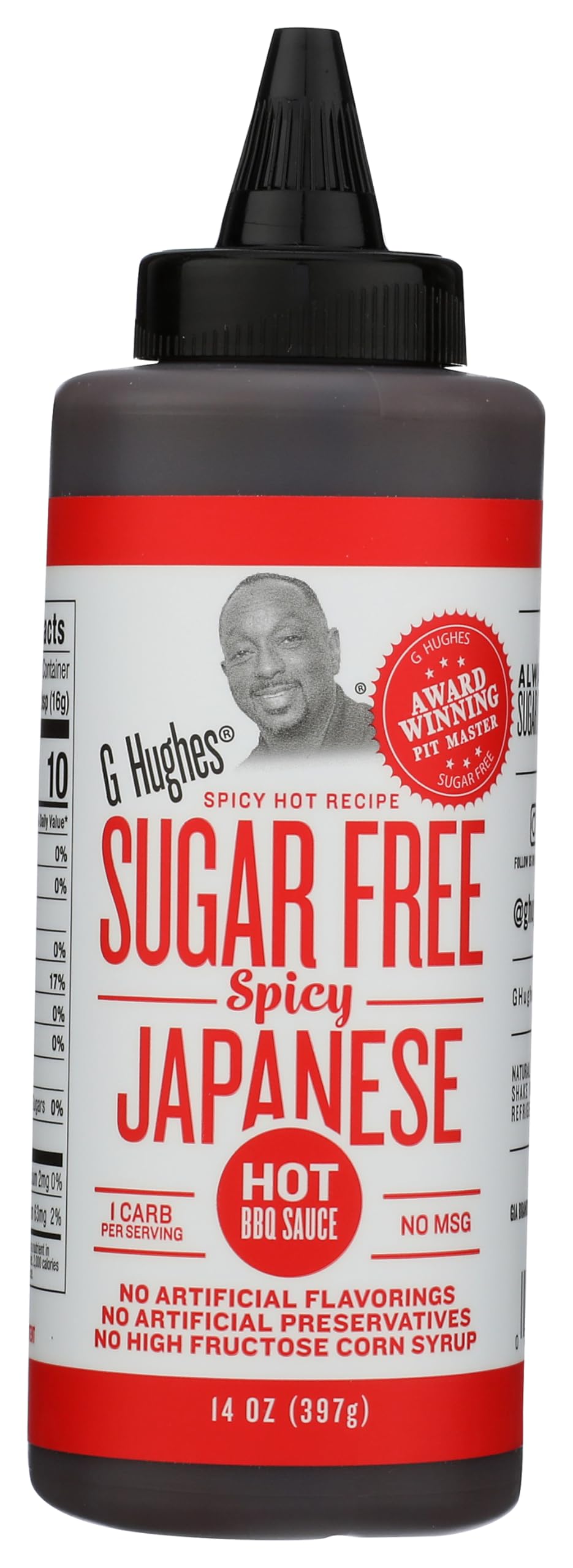 G Hughes sugar-free spicy Japanese BBQ bottle on the counter, ready to pour for grilling.