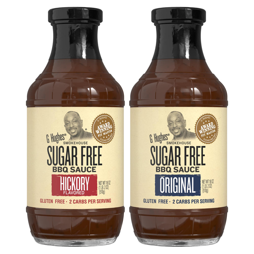 G Hughes Sugar Free Hickory BBQ sauce bottle pouring over grilled meat.
