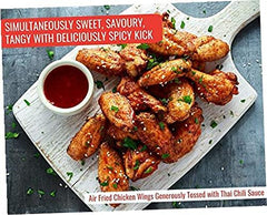 G Hughes Thai Chili Wing Sauce drizzle on dumplings and vegetables