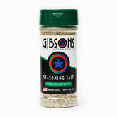 Gibsons Steakhouse Seasoning Salt jar ready to season steaks evenly and boost flavor.