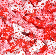 Gift Boutique heart-wrapper designs close-up, adds festive flair to celebrations.