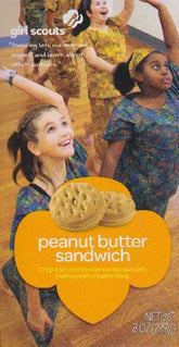 Girl Scout Cookies Peanut Butter Sandwich close-up showing creamy filling for a satisfying snack.