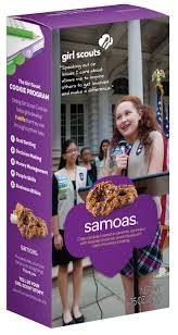 SAMOAS Girl Scout Cookies on plate, rich coconut caramel bite for snacking.