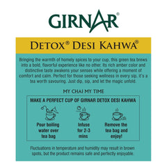 GIRNAR Detox Green Tea steeping in a mug for warmth.