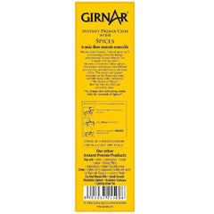 Opened Girnar Instant Chai premix sachet poured into mug for fast tea