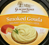 Glacier Ridge Farms smoked Gouda spread in a tub, creamy texture ideal for crackers.