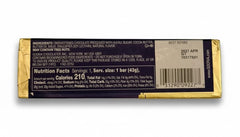 Unwrapped Godiva dark solid bar reveals rich texture and deep cocoa notes.