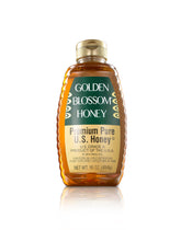 Golden Blossom honey jar front shows pure sweetness for tea and toast.