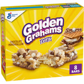 Golden Grahams Smores bars packaging on kitchen counter; convenient on-the-go snack.