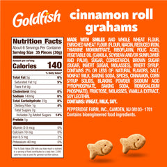 Goldfish Grahams Cinnamon Roll crackers close-up with crumbs, perfect for a playful crunch any time.