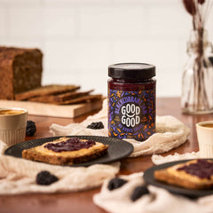 GOOD GOOD Blackcurrant Jam spoon dipping emphasizes natural ingredients and real fruit taste.