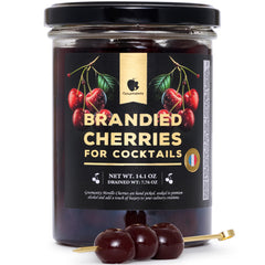 Gourmanity brandied cherries in Kirsch bottle highlight premium cocktail garnish.