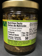 Close-up of fresh herbs in Goya Chimichurri with olive oil sheen.