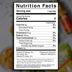 Grace Yellow Scotch Bonnet hot sauce pour on jerk chicken for a fiery, fruity finish.
