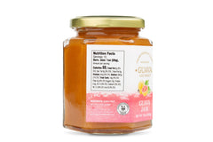 Guava Gourmet jar pour showing drizzle-ready jam for glazes and toppings.