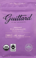 Guittard Organic 38% wafers melting into a glossy ganache for desserts.