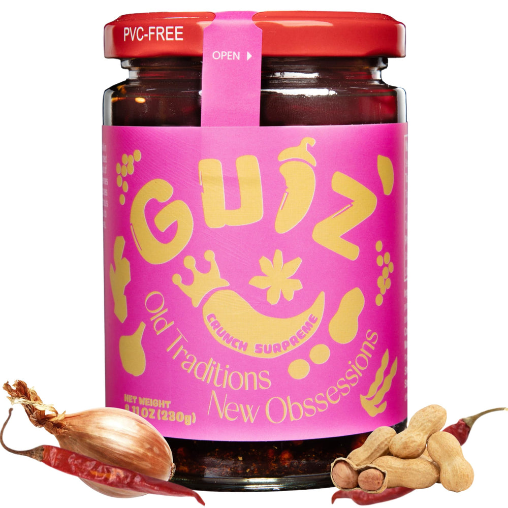 GUIZ Crunch Supreme jar close-up with crunchy shallots and chilies, ideal for bold noodles