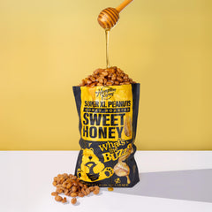 Hampton Farms extra-large peanuts close-up for premium snacking crunch.