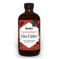 Hany's Harvest Carolina Reaper Fire Cider bottle with fiery label ideal daily wellness booster