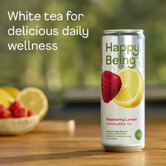 Happy Being Raspberry Lemonade Sparkling White Tea poured into a glass — bubbly and bright.