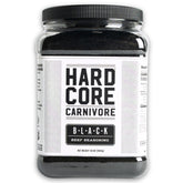 Hardcore Carnivore Black activated charcoal rub bottle close-up for rich beef flavor.