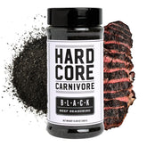 Hardcore Carnivore Black bottle front view, premium charcoal rub for bold steaks.