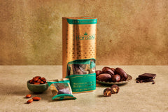 Harison hand-stuffed date dipped in dark chocolate, showcasing premium texture.