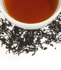 Brewed cup of Harney & Sons Black Currant Tea with rich aroma and medium body.