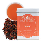 Harney & Sons Peach Fruit Tea loose-leaf setup, caffeine-free refreshment for hot or iced brewing.