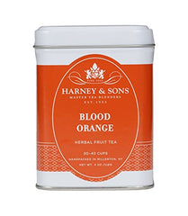 A cup of Harney & Sons Blood Orange Fruit Tea showing a bright amber brew