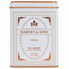 Harney & Sons chai spiced black tea sachets in a decorative tin for convenient brewing.