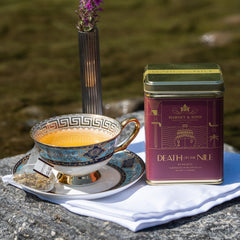 Cup of Death on the Nile tea brewing, pale liquor and inviting aroma for unwinding.