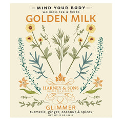 Steaming Golden Milk latte in a mug by Harney & Sons for a cozy moment.