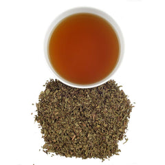 A prepared cup of Harney & Sons Organic Peppermint tea, refreshing and caffeine-free.