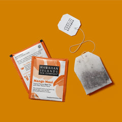 Hawaiian Islands Tea Company Mango Maui Black Tea brewed in glass reveals bright amber infusion