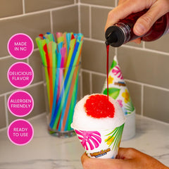 Hawaiian Shaved Ice blue raspberry syrup pour adds tart sweetness.