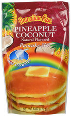 Hawaiian Sun Pineapple Coconut Pancake Mix packaging on a kitchen counter for quick island breakfasts.