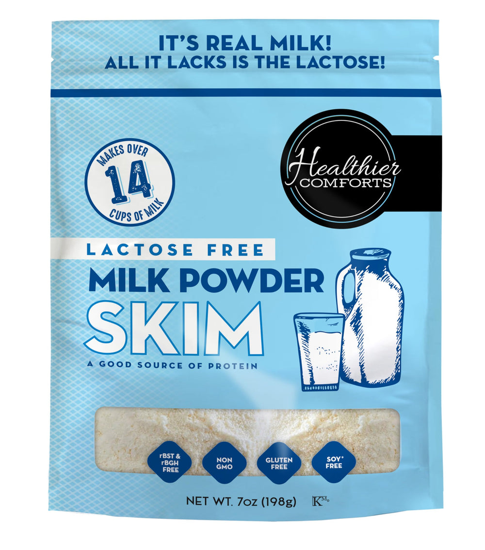 Healthier Comforts lactose-free skim milk powder packaging on shelf.