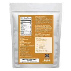 Healthworks Flax Seed Organic powder in a spoon, ideal for smoothies and cereals.
