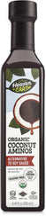 Heaven & Earth Coconut Aminos bottle pouring as a soy-free sauce alternative for meals
