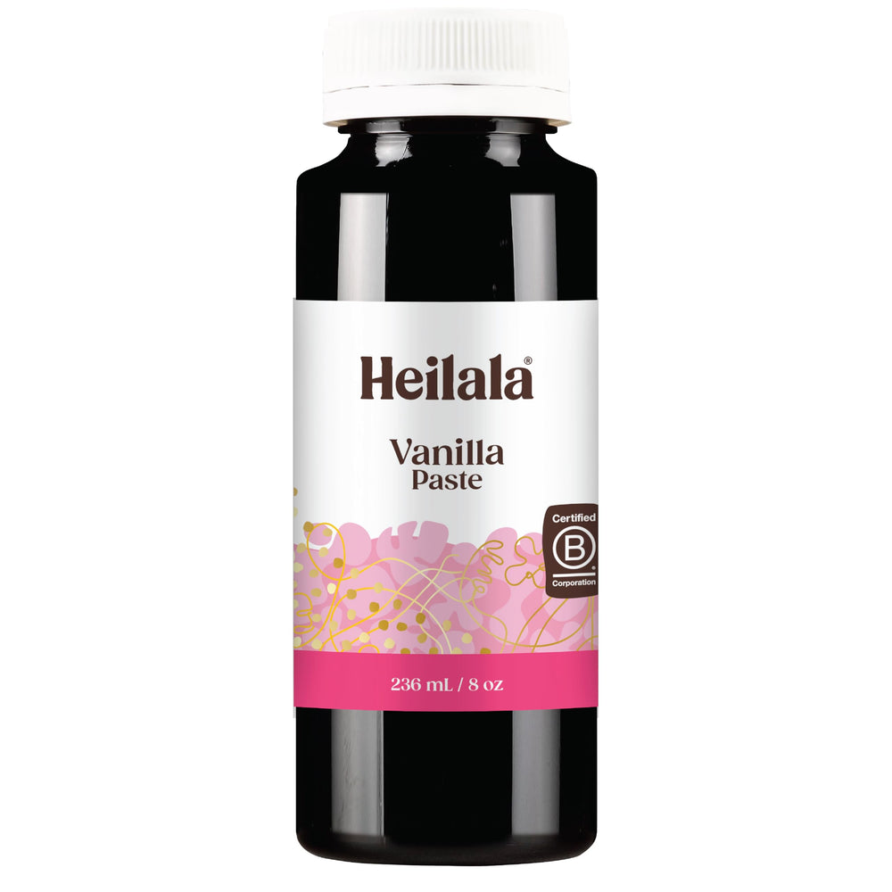 Heilala Vanilla Paste jar close-up showing seeds for rich vanilla flavor in baking.